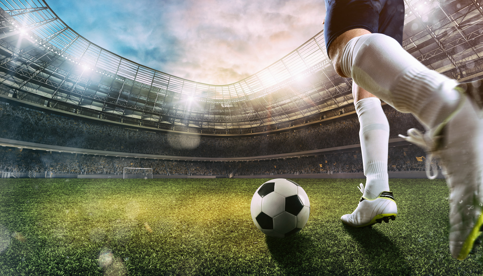 homem jogando futebol